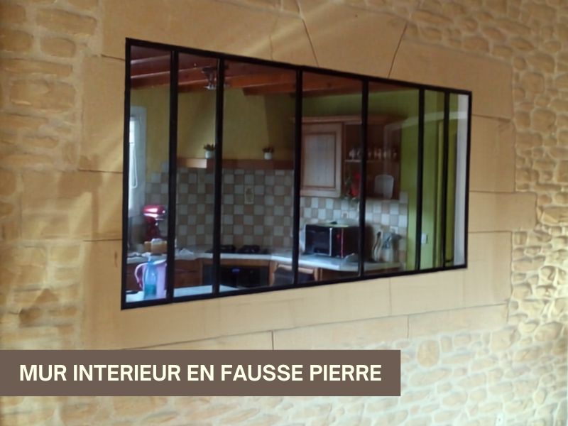 La Pierre d'Uzel réalise votr emur interieur en fausse pierre et peut faire de l'enduit fausses pierres.